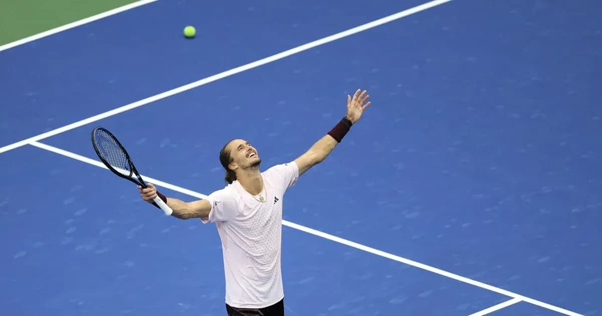 Player celebrating on the tennis court after winning point