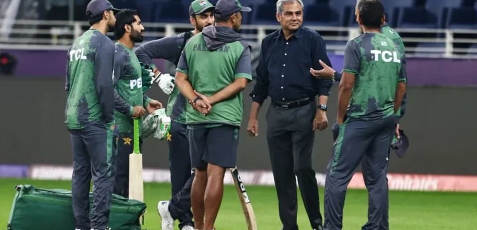 Pakistan cricket team members discussing on the field