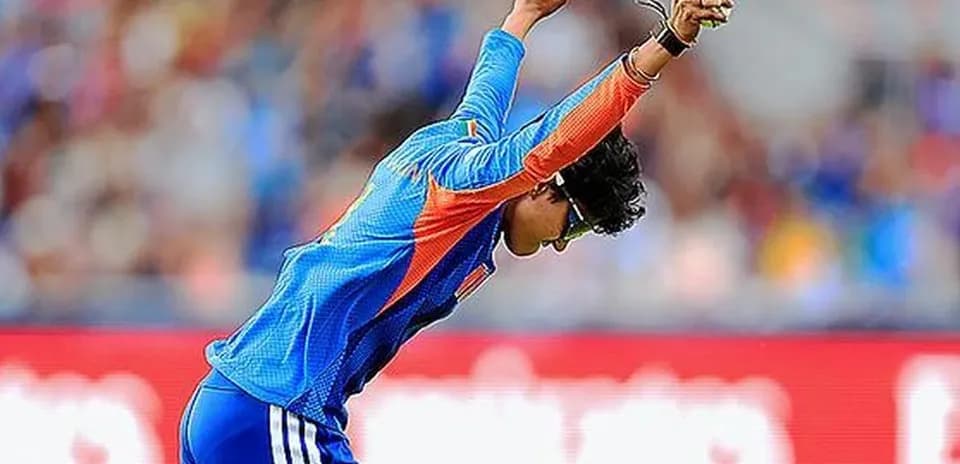 Player celebrating a wicket during cricket match