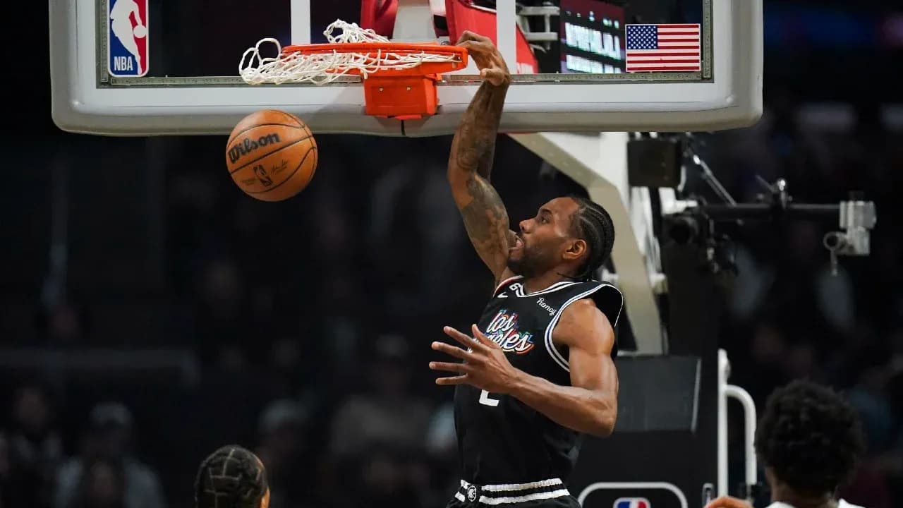 Player dunking a basketball during a game