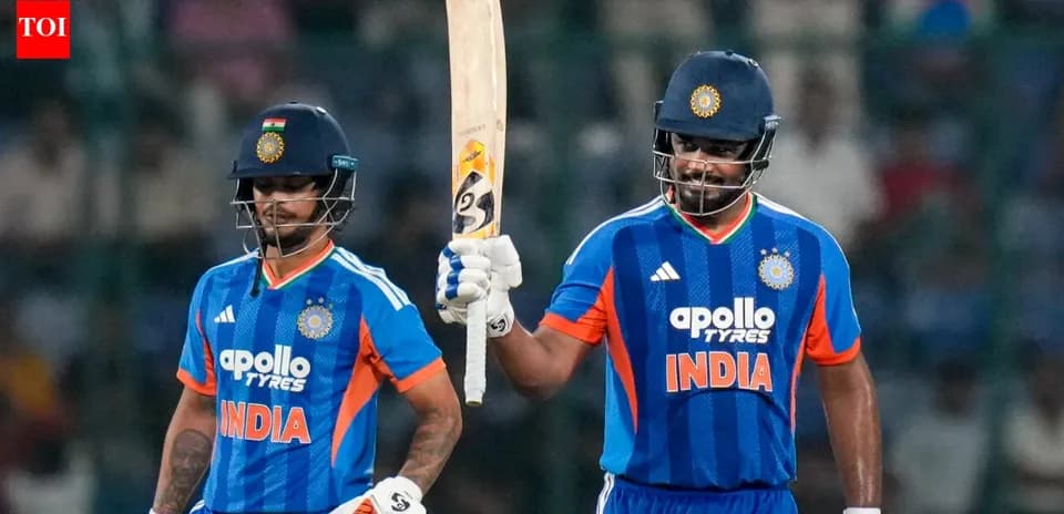 Two Indian cricketers celebrating after scoring runs