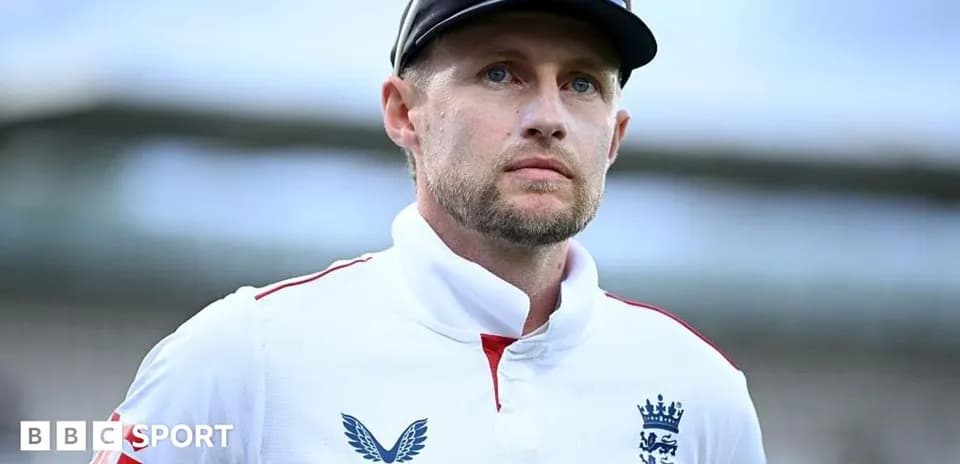 Cricketer in England jersey looking thoughtfully