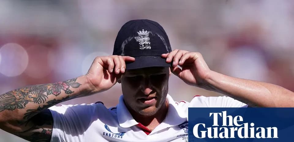 Cricketer adjusting his cap during a match