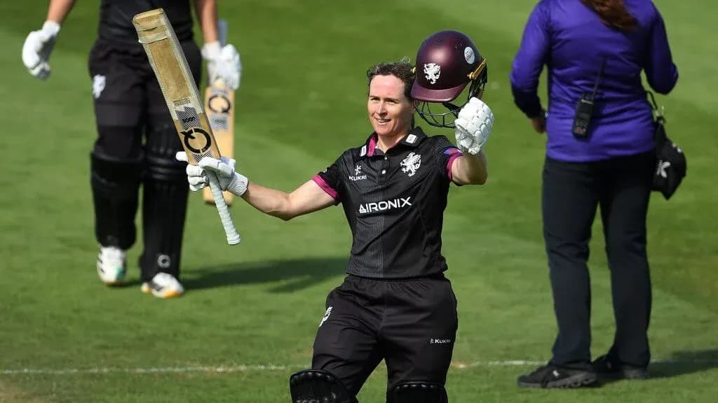 Batsman celebrating after scoring a century
