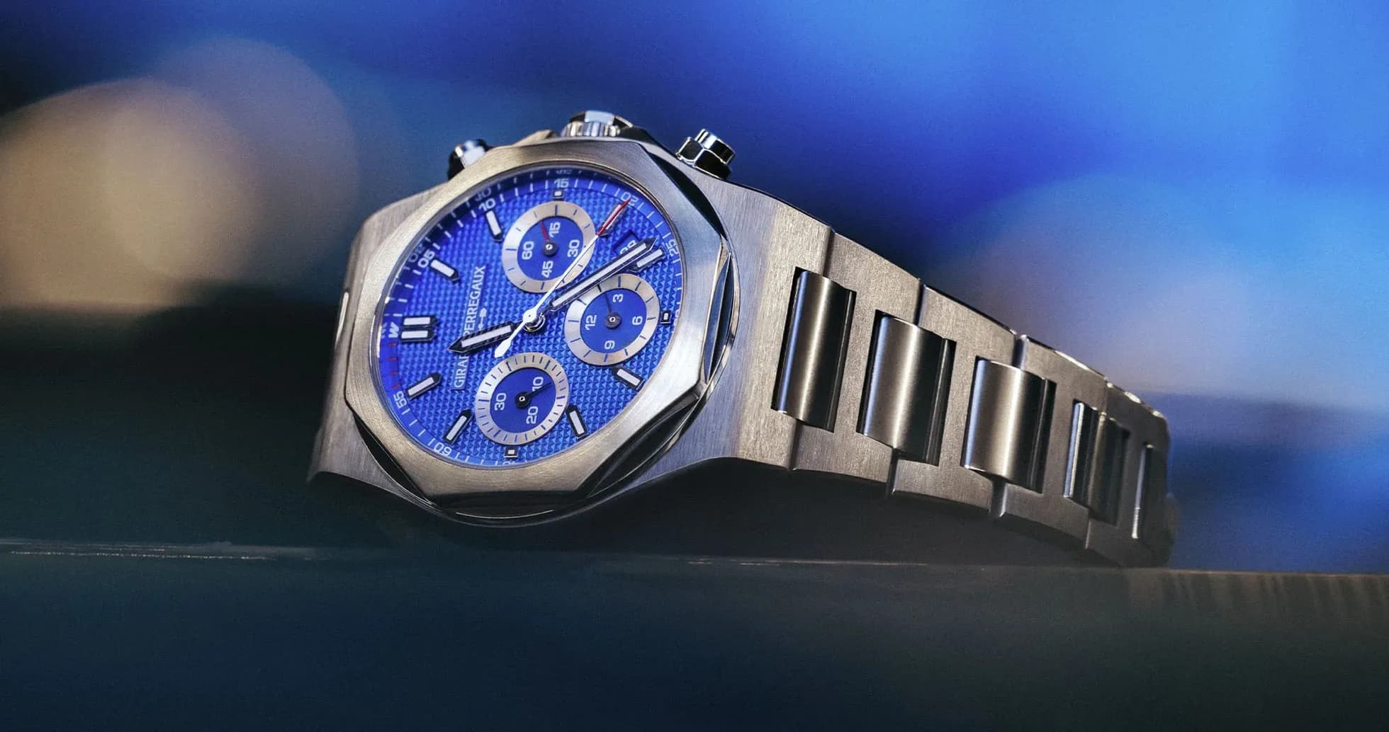 Luxury watch with blue dial and stainless steel band