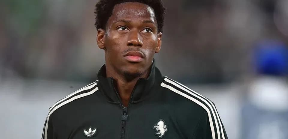 Player in warm-up jacket before the match