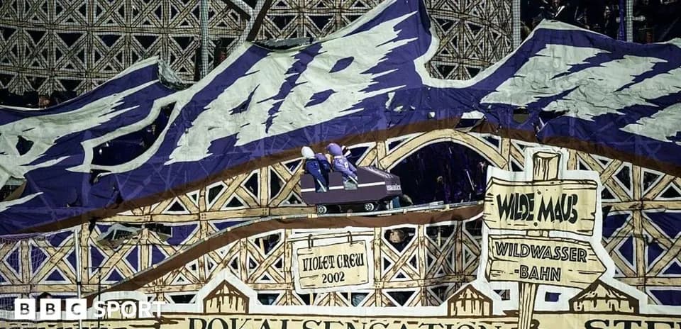 Large colorful fan banner displayed at stadium