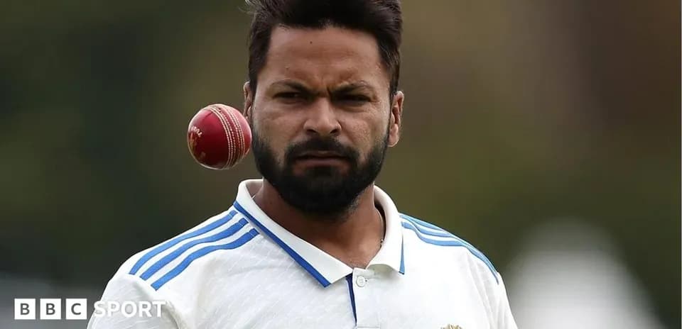 Cricketer focusing on a ball during practice
