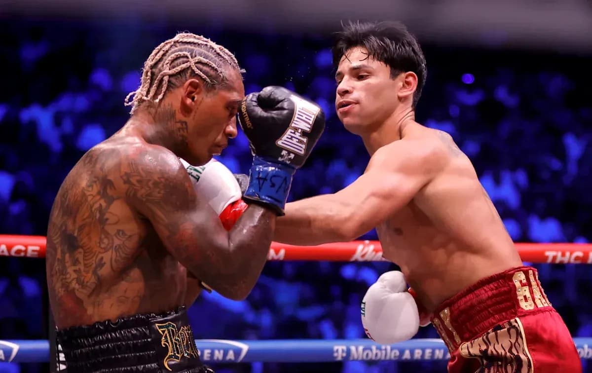 Two boxers exchanging punches in the ring
