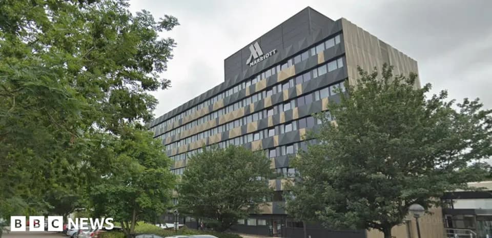 Marriott hotel building with surrounding trees