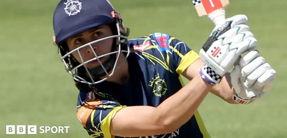 Batter preparing to hit the ball in cricket match