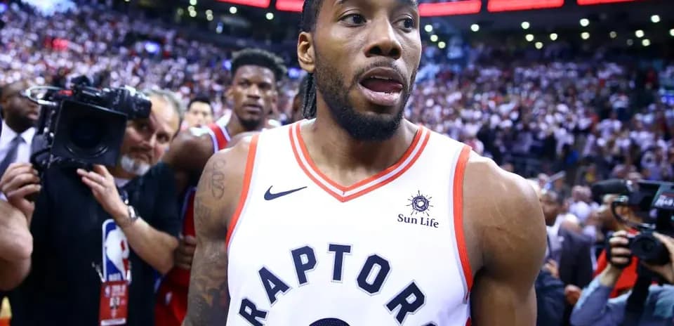 Kawhi Leonard walking off court after game