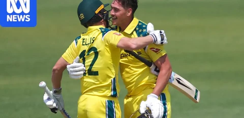 Australian cricketers celebrating a run during match