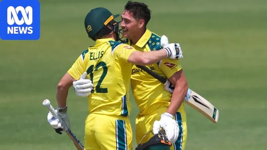 Australian cricketers celebrating a run during match