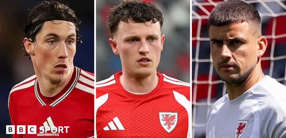Three Welsh football players in team jerseys