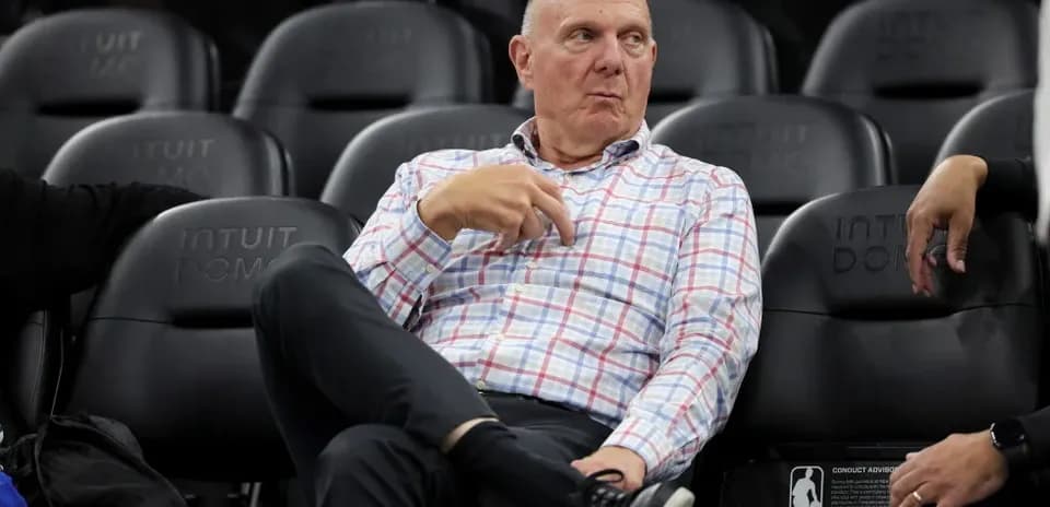 Person seated on bench at Intuit Dome arena