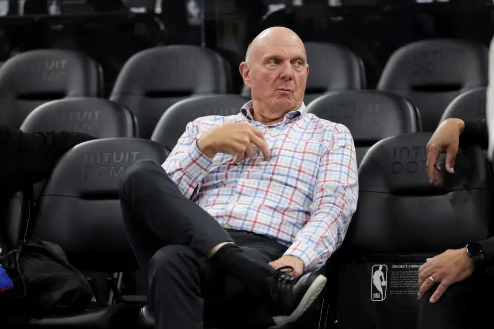 Person seated on bench at Intuit Dome arena