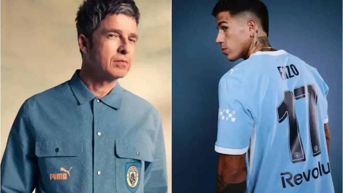 Man in blue shirt and footballer in kit