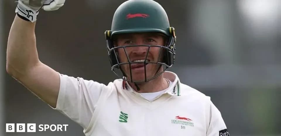 Cricketer celebrating after scoring a run