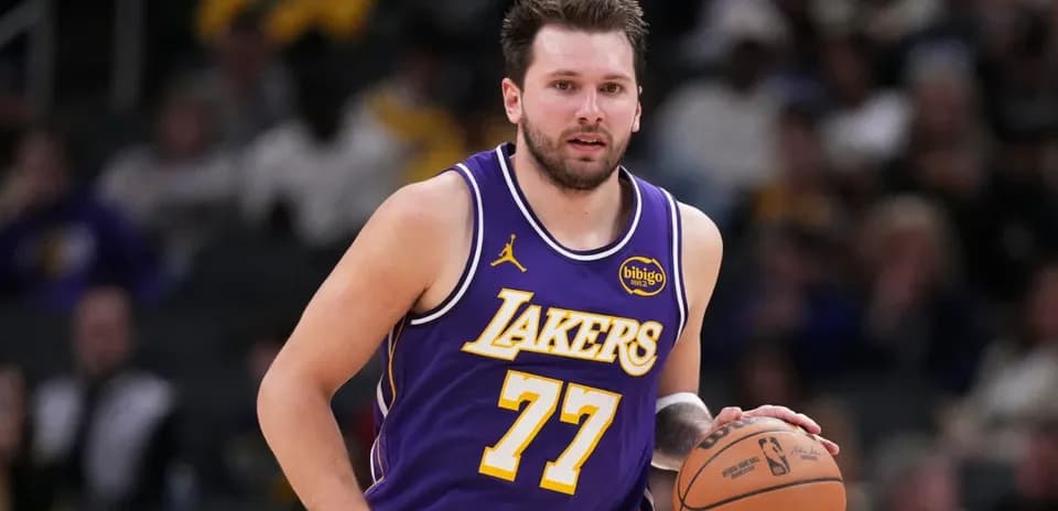 Player dribbling basketball during game