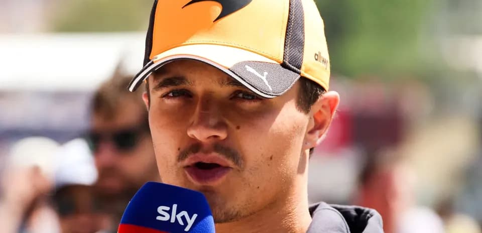 Driver speaking into microphone during event