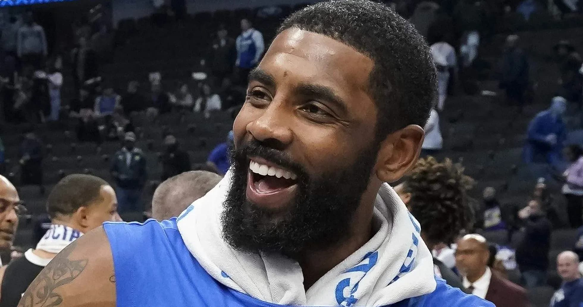 Player celebrating after a game in team jersey