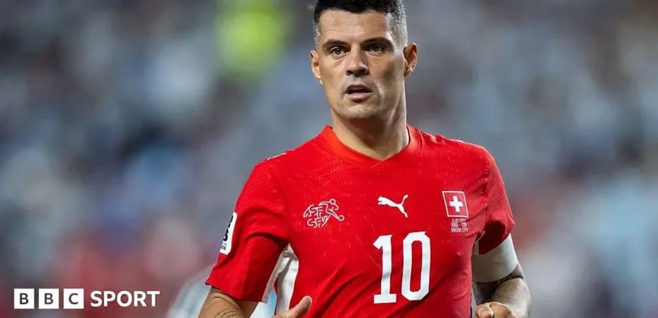 Player in red jersey during match action