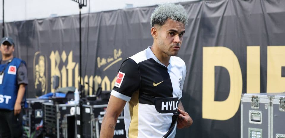 Player walking off the pitch after match