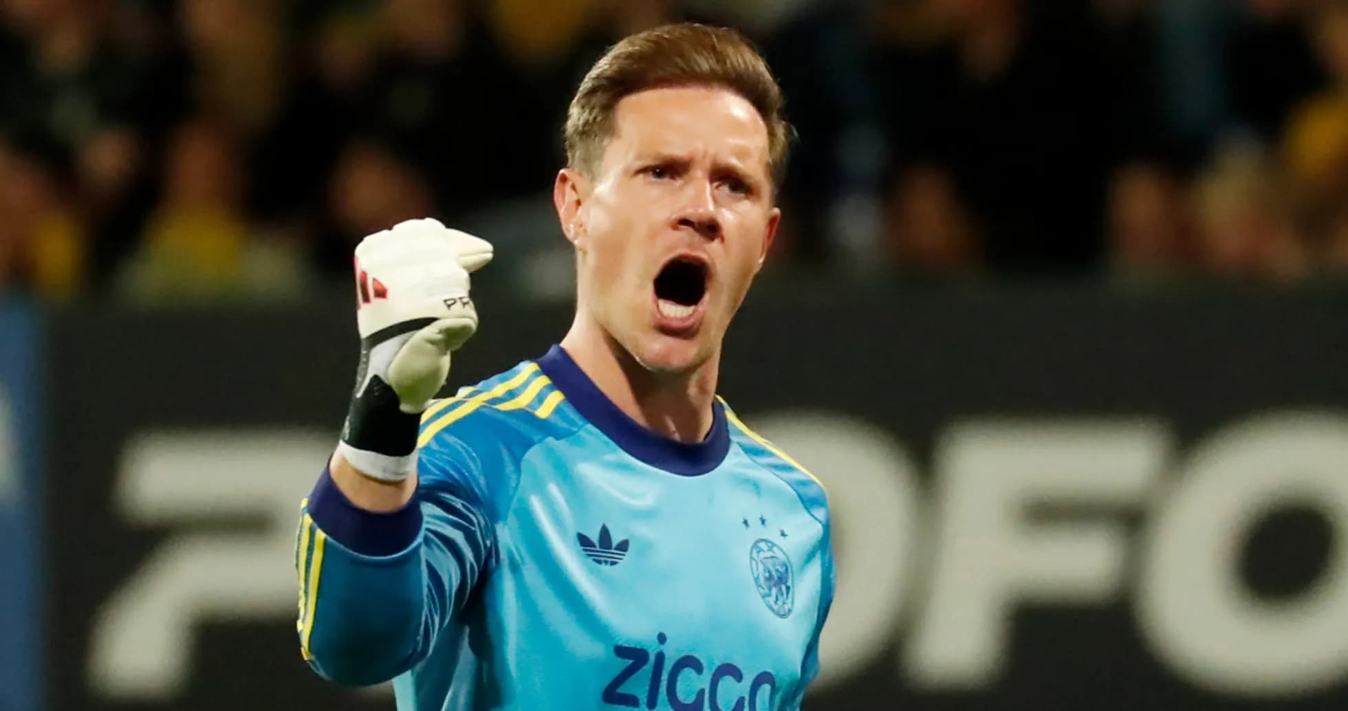 Goalkeeper celebrating after making a save
