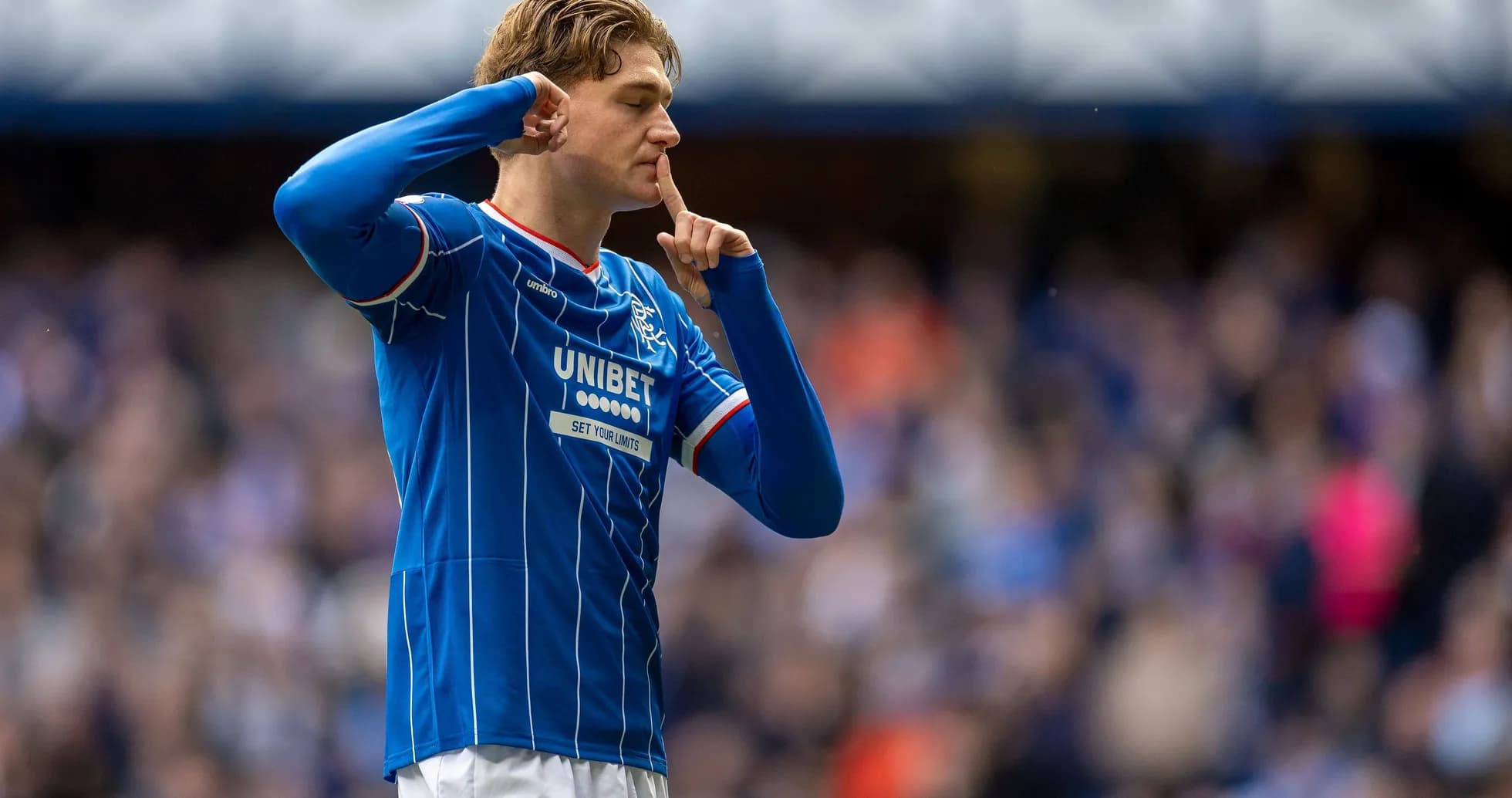 Player celebrating with finger to lips gesture