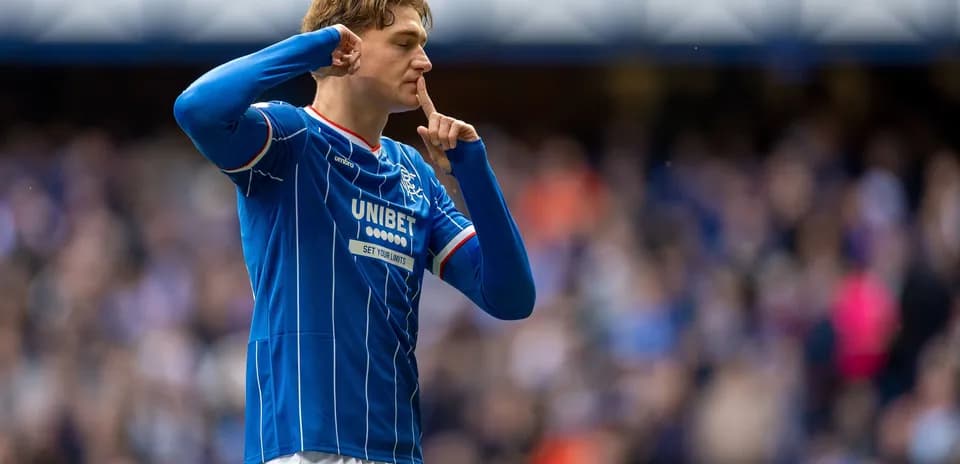 Player celebrating with finger to lips gesture
