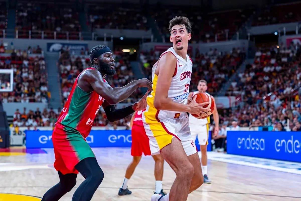 Player from Spain being guarded during basketball game