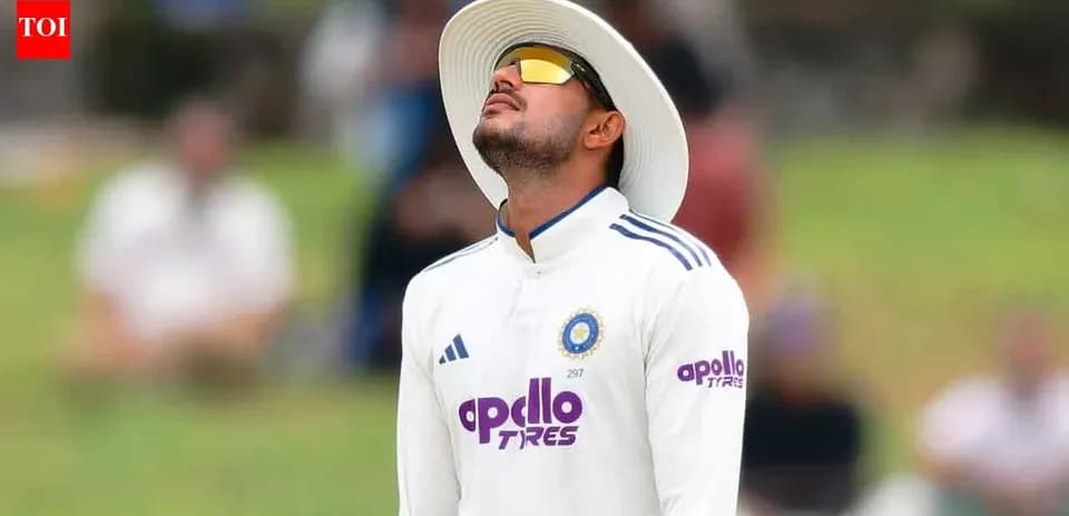 Cricketer looking up during match on field