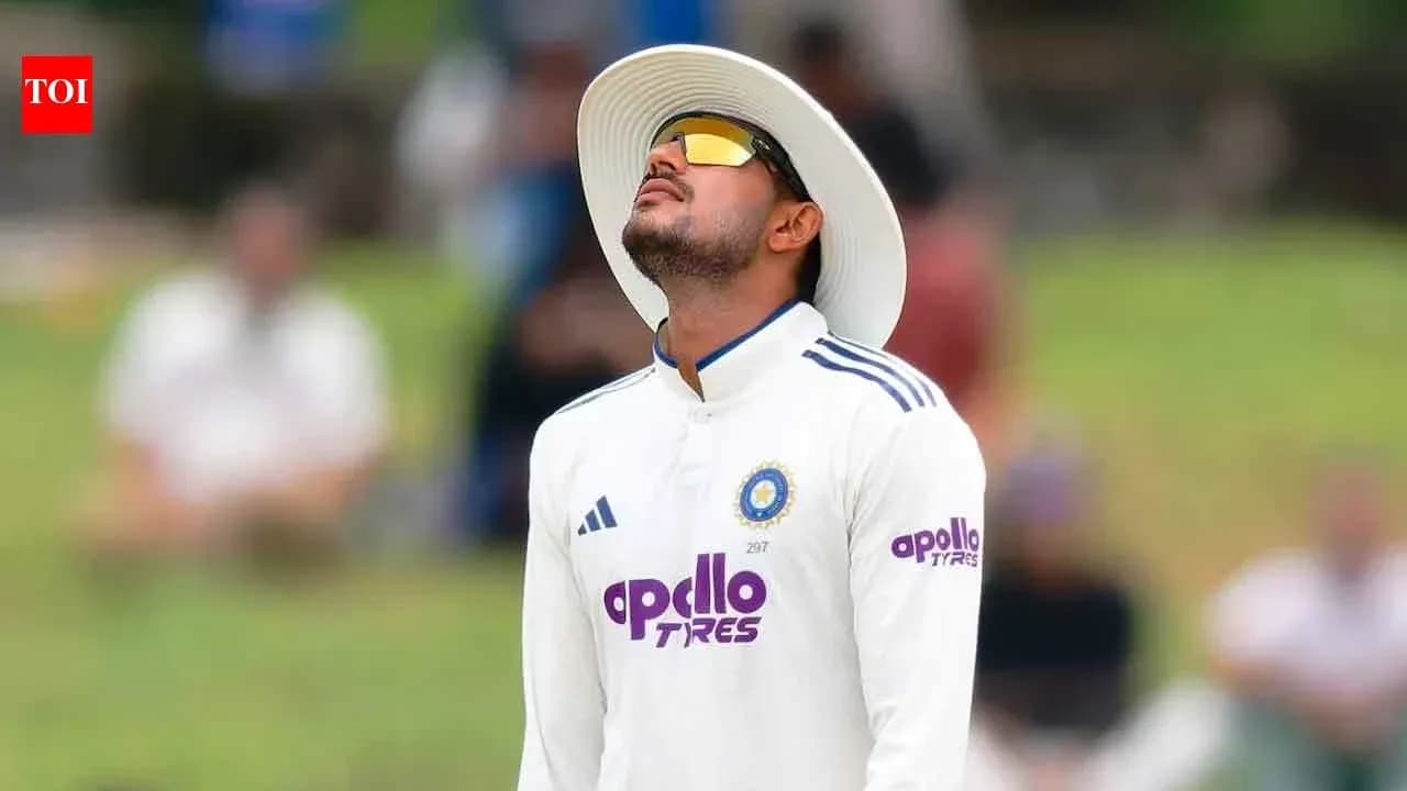Cricketer looking up during match on field
