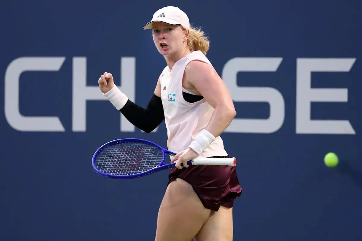 Tennis player celebrating a point during match