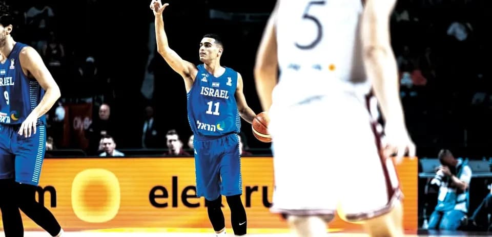 Israeli player signaling during basketball match