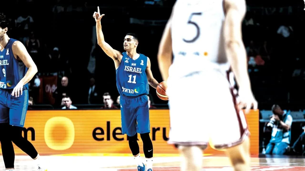 Israeli player signaling during basketball match