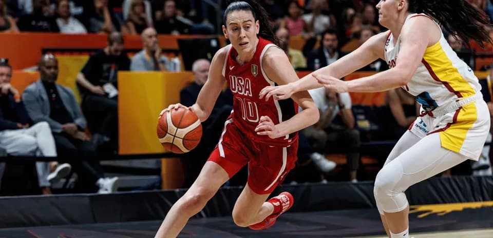 Player dribbling the ball during basketball game