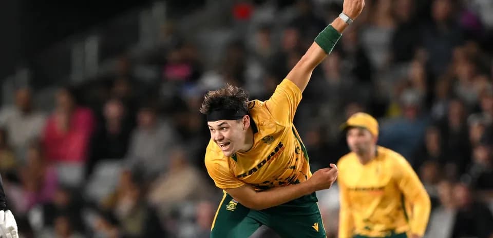 Bowler delivering ball during cricket match