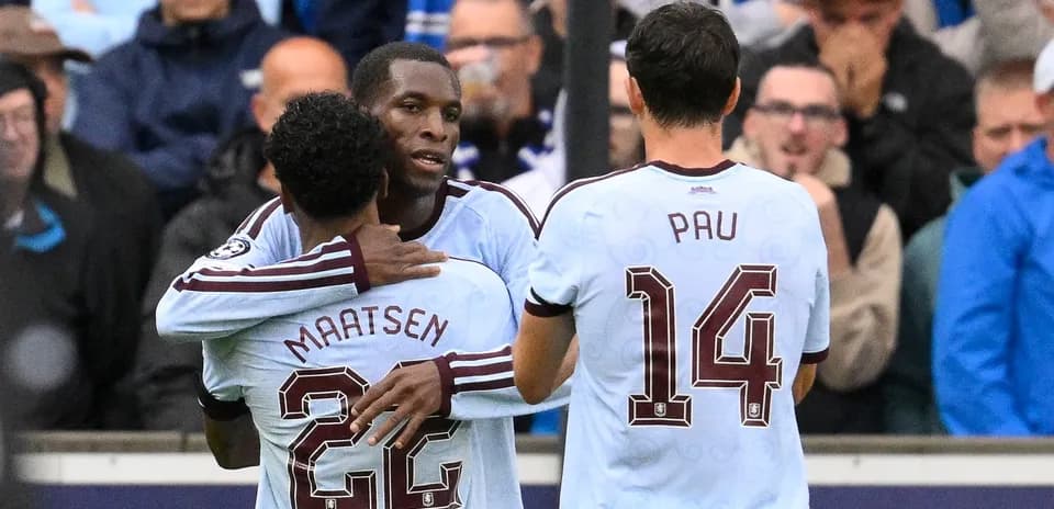 Players celebrating after a goal during match