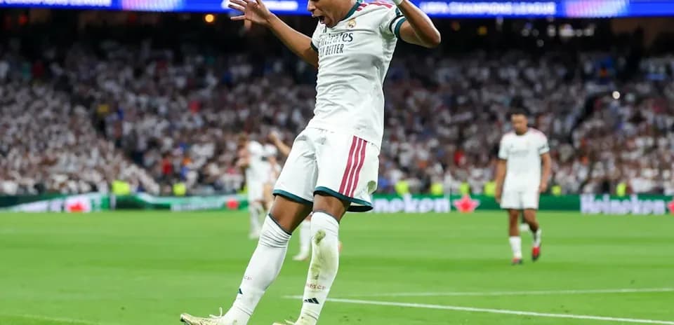 Player celebrating goal on the pitch during match