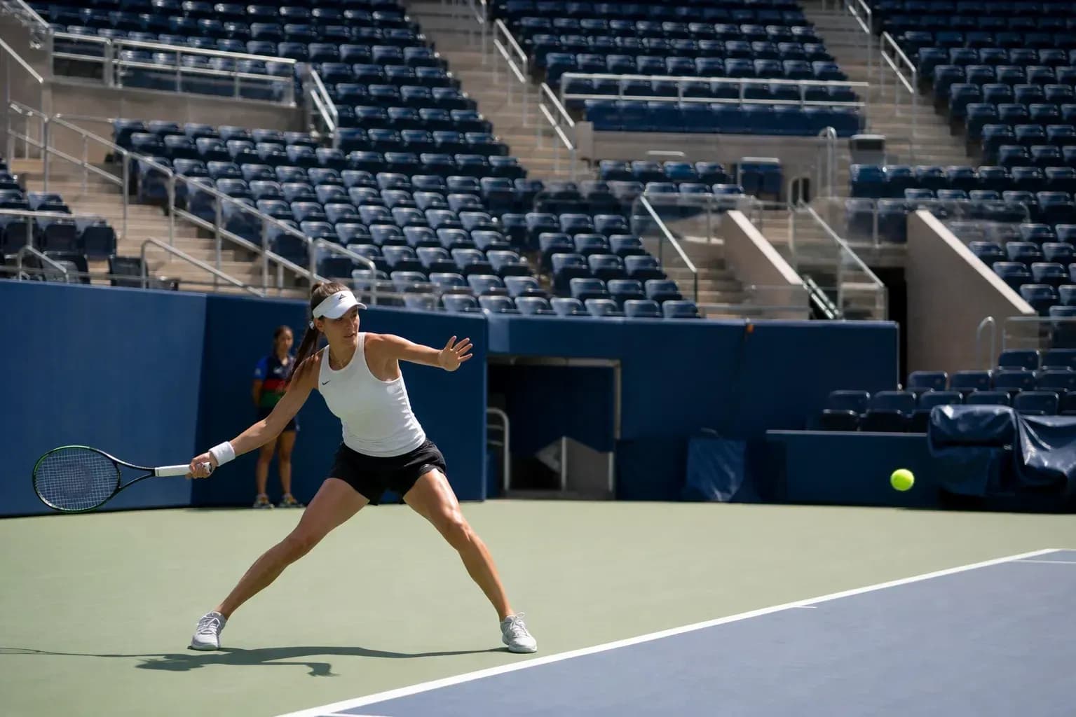 Female tennis player preparing to hit a ball