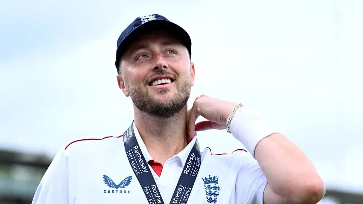 Cricketer smiling with medal after match