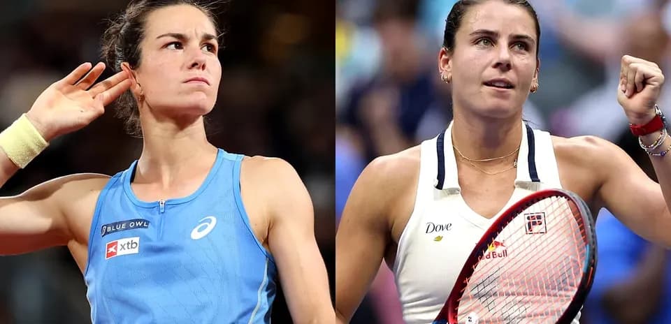 Two female tennis players celebrating on court