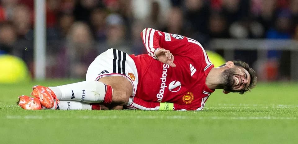 Player lying on the ground in pain during match