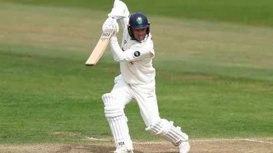 Batsman preparing to hit ball during cricket match