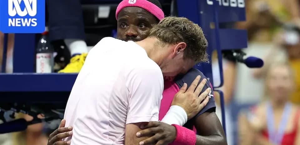 Two players embracing after a match at US Open