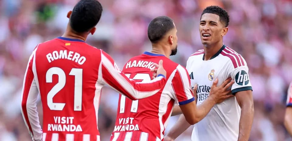Three players in dispute during a football match