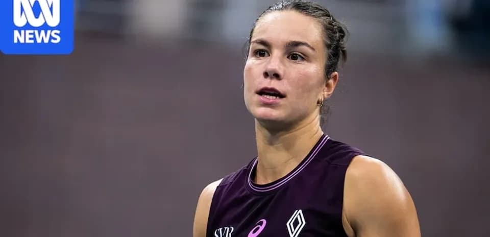 Athlete in purple jersey during competition