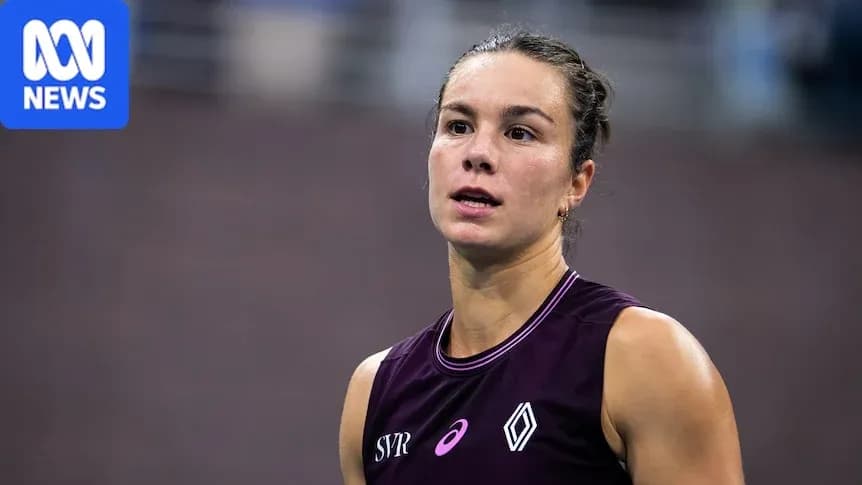 Athlete in purple jersey during competition